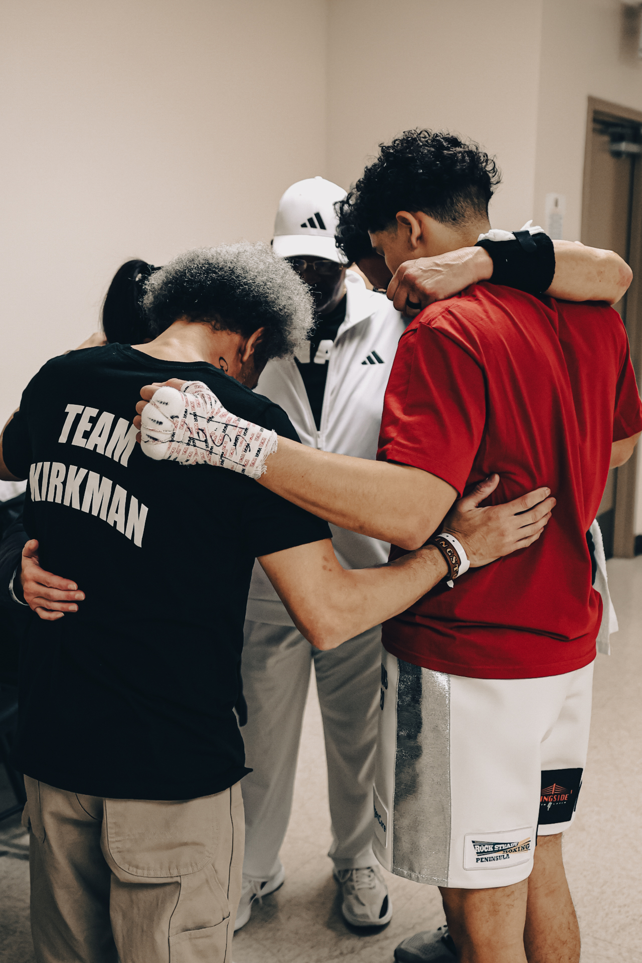 Team prayer before the fight