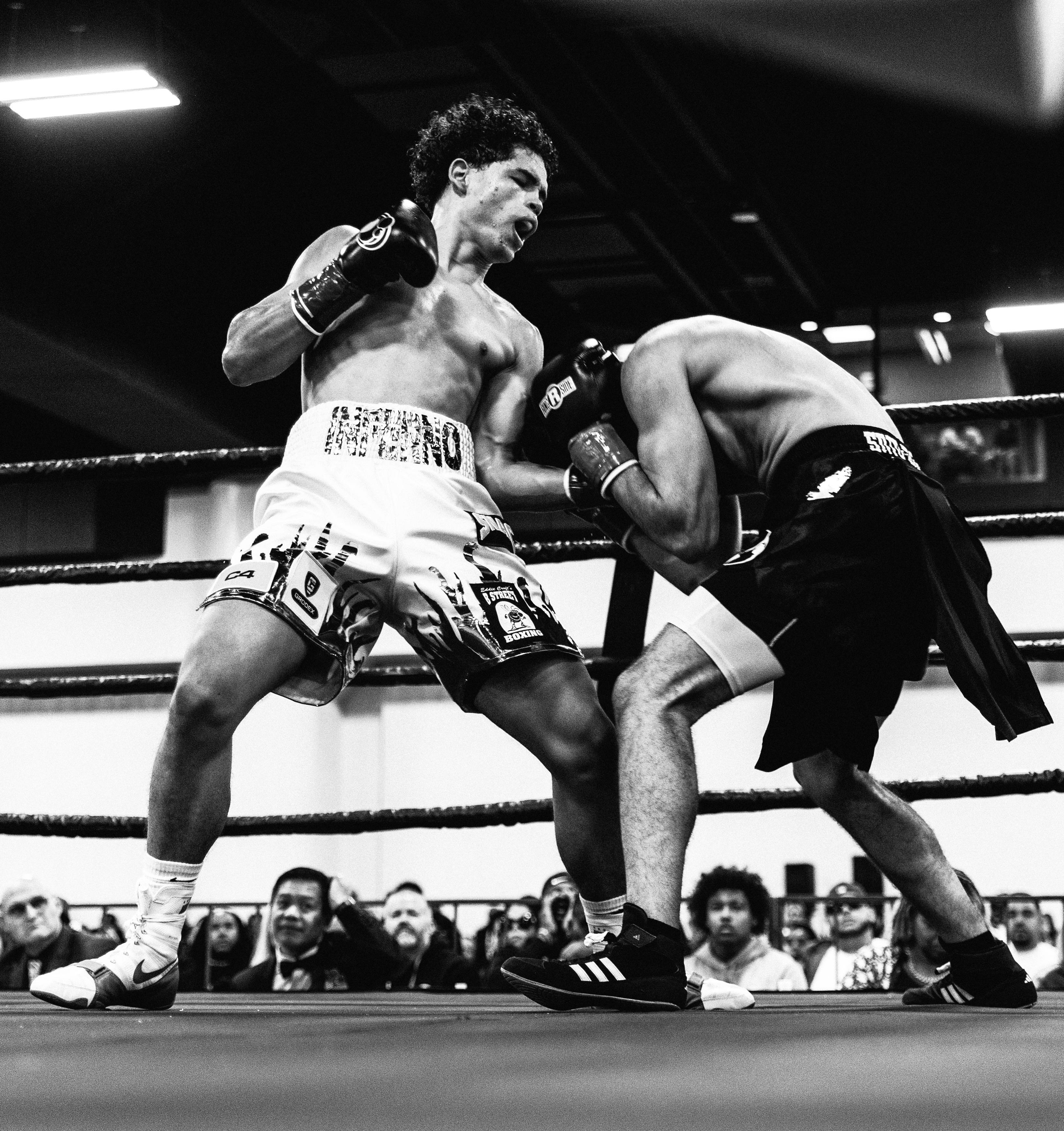 Black and white in-ring exchange